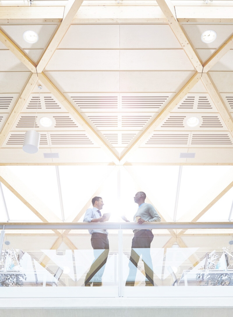 GettyImages-610053291-People-in-Hallway-Crop-Tall